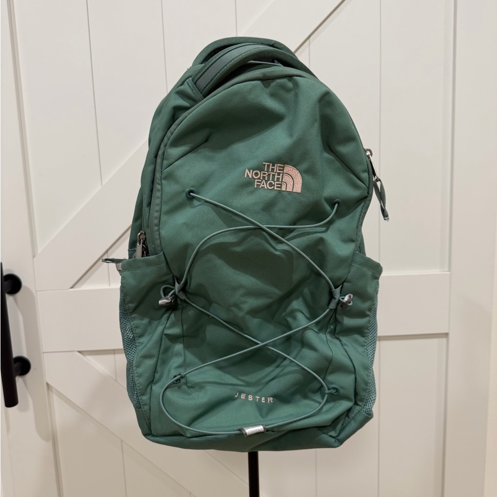 The North Face Jester Teal Backpack with Pink accent